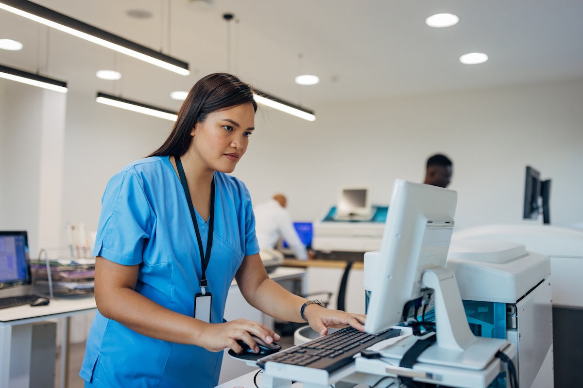 Nurse entering charting info