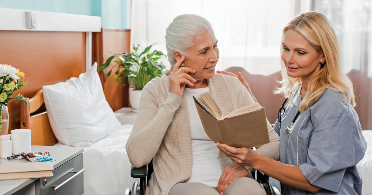 CNA spending time with patient resident