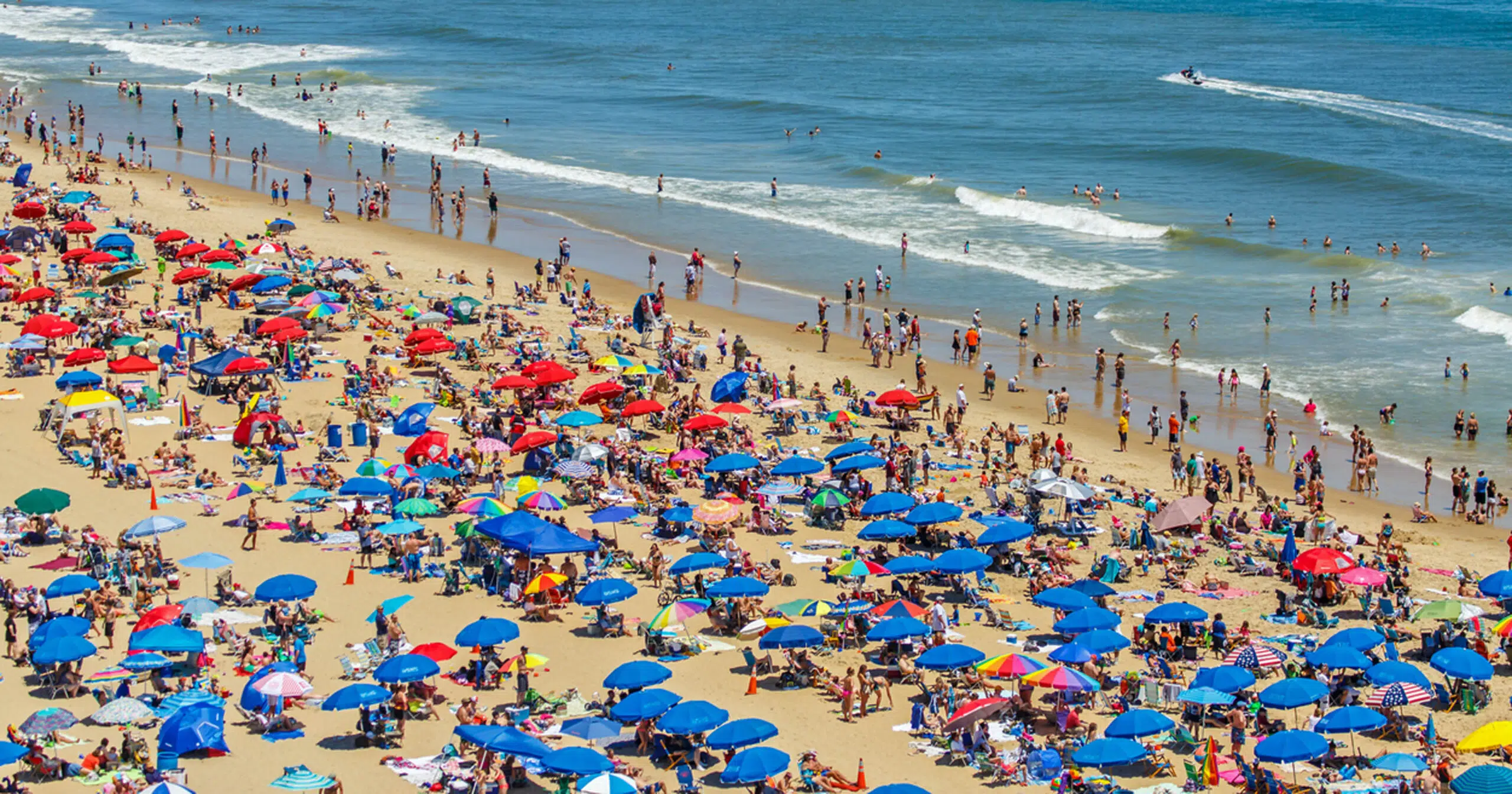 Crowded California beach during tourist season