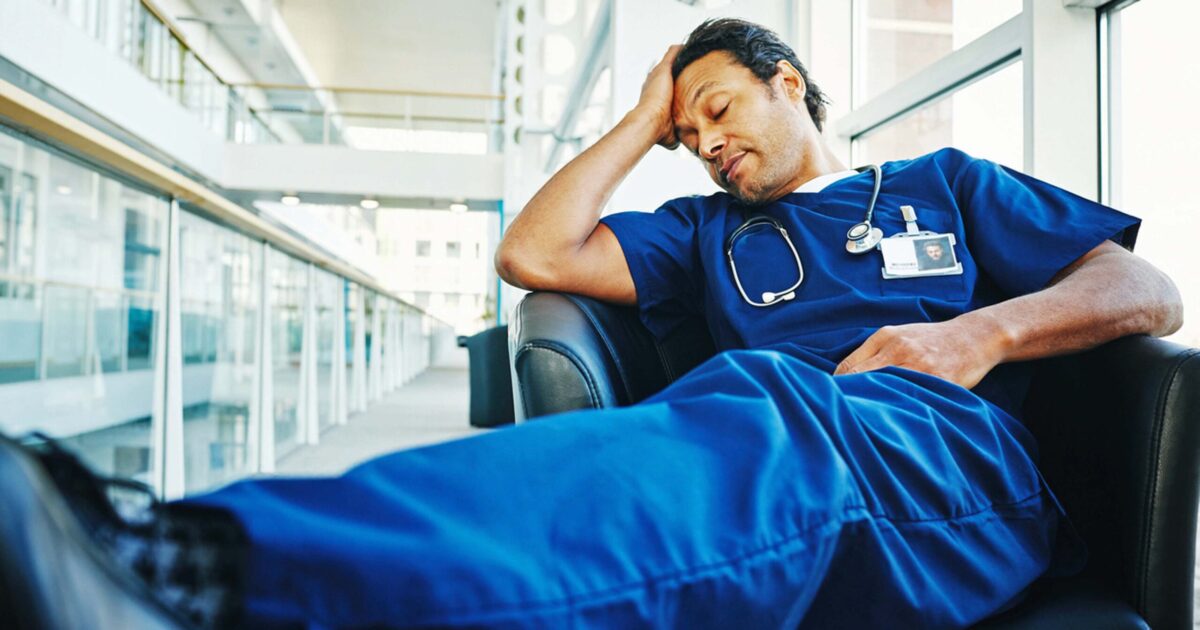 Exhausted healthcare professional suffering burnout